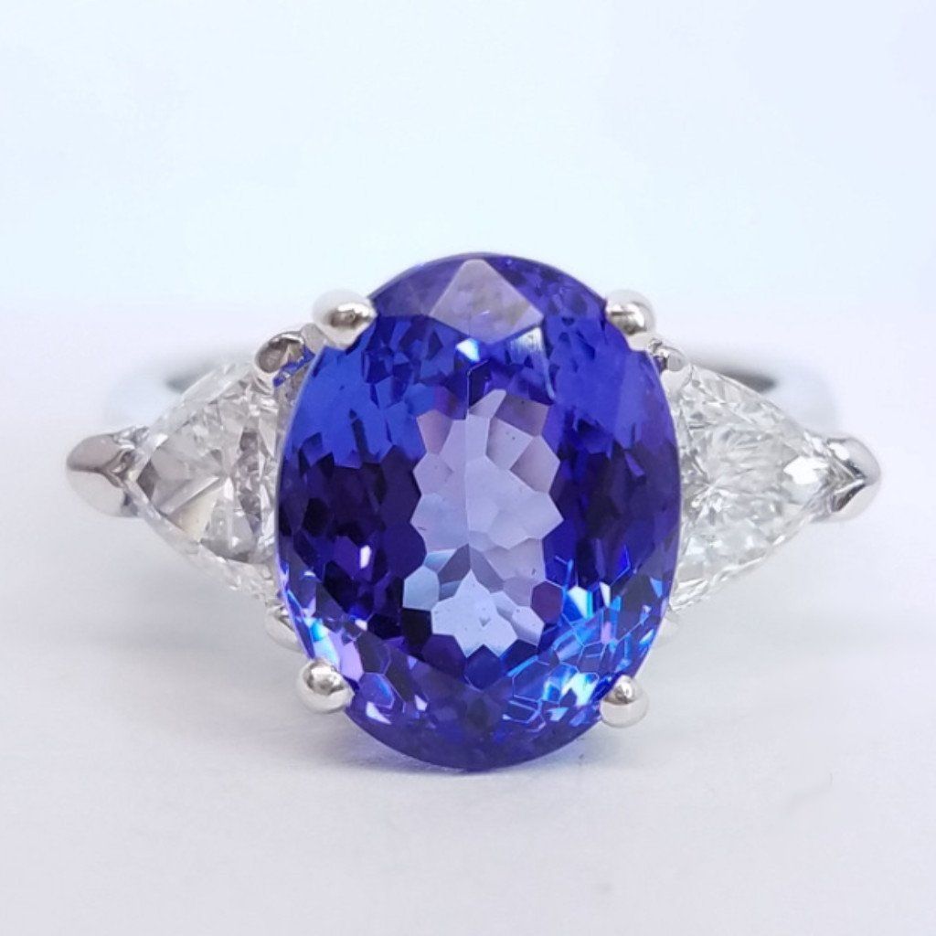 7.18 Total Carat Tanzanite and Diamond Three Stone Ladies Ring