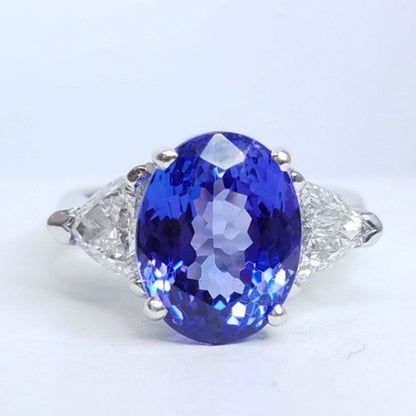 7.18 Total Carat Tanzanite and Diamond Three Stone Ladies Ring