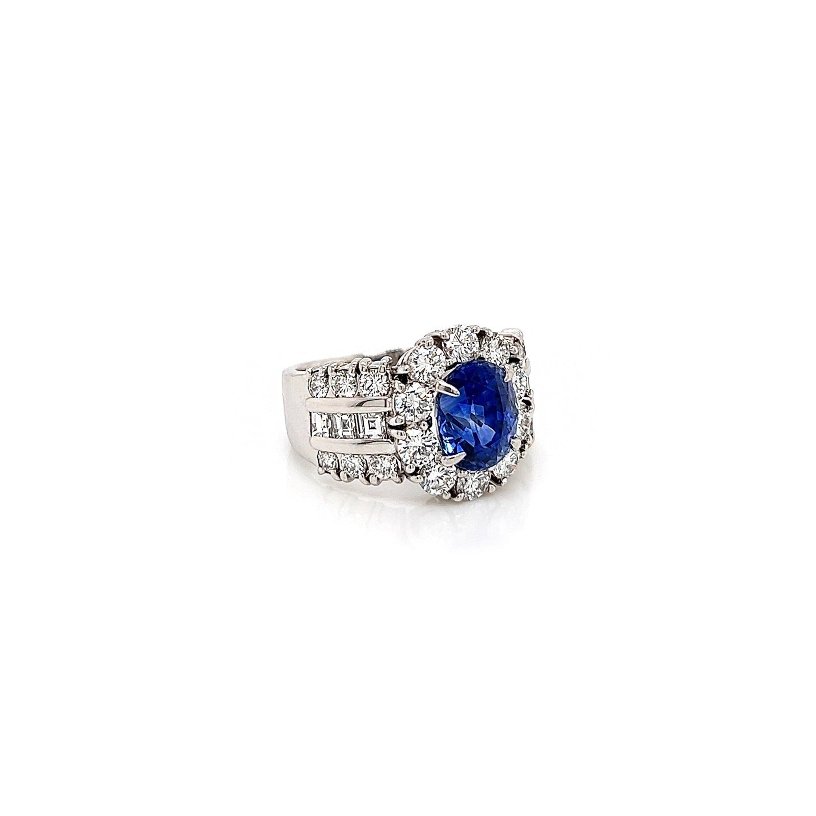 5.61 Total Carat Sapphire and Diamond Halo Channel-Set Ladies Ring