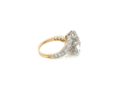 2.10 Total Carat Three-Stone Vintage Gold Ring with Pave Diamonds