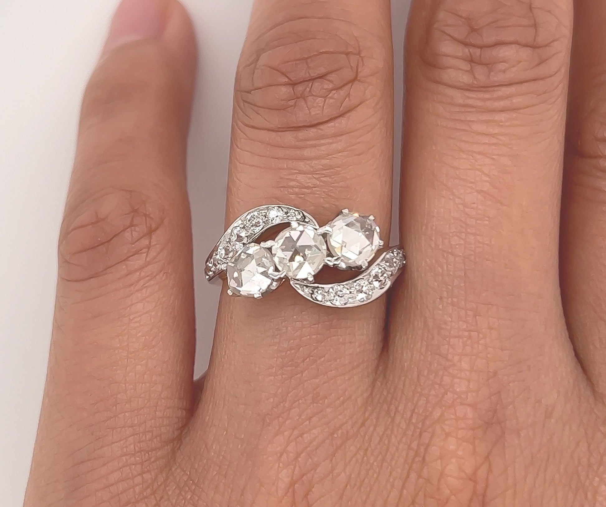 2.10 Total Carat Three-Stone Vintage Gold Ring with Pave Diamonds