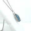 Aqua Blue Topaz & Diamond Pendant Necklace in 18K White Gold