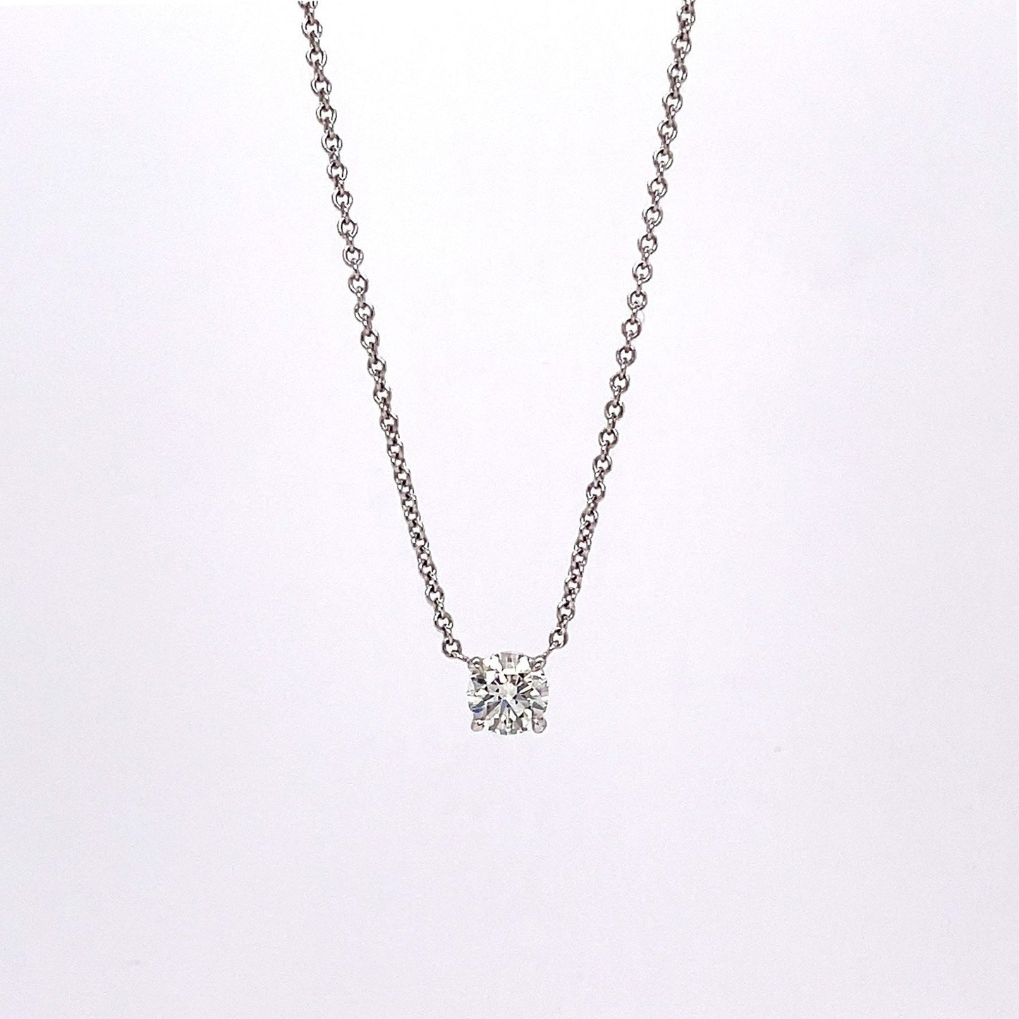 "PEND01787" 0.50 CARAT ROUND BRILLIANT CUT PENDANT IN 18K WHITE GOLD