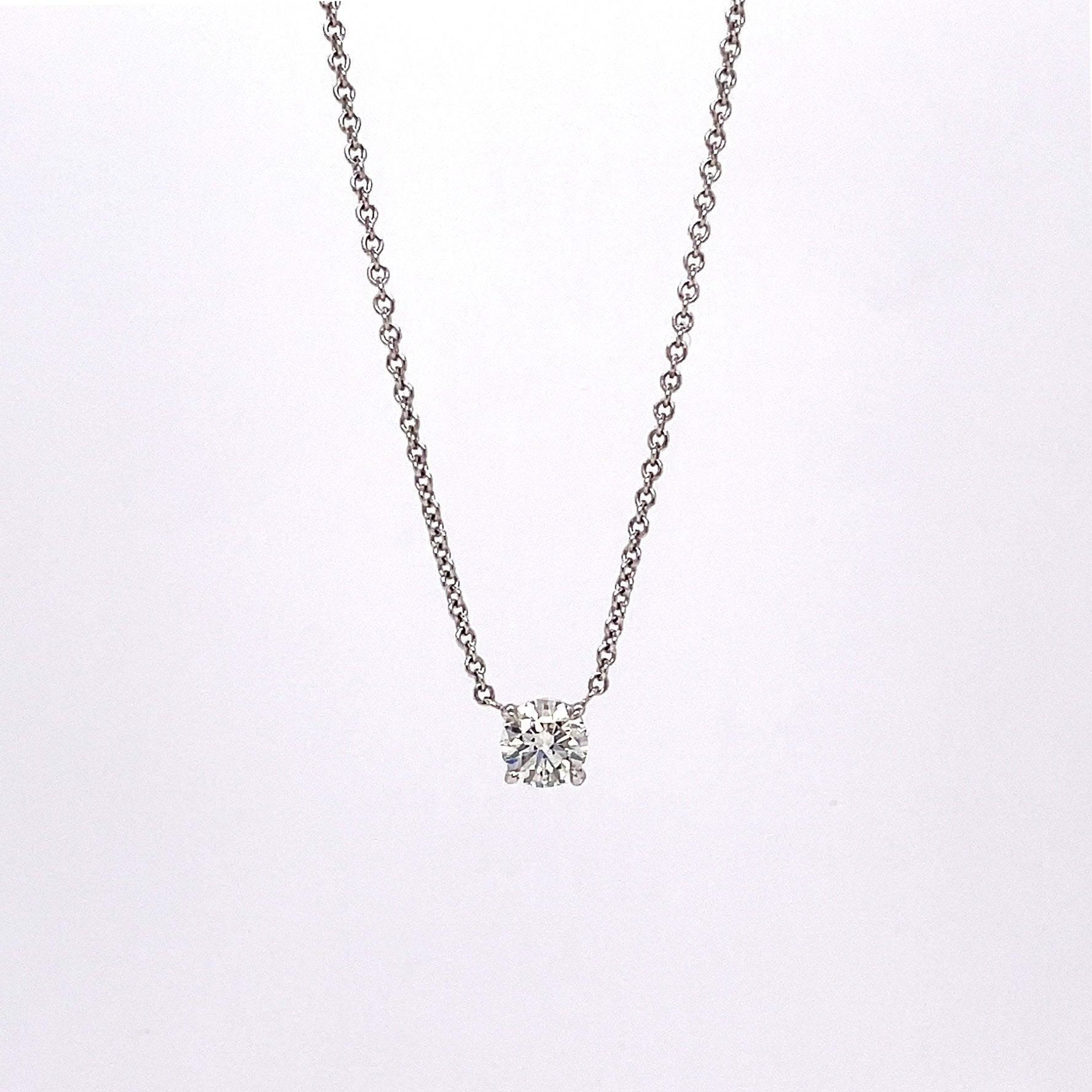 "PEND01787" 0.50 CARAT ROUND BRILLIANT CUT PENDANT IN 18K WHITE GOLD