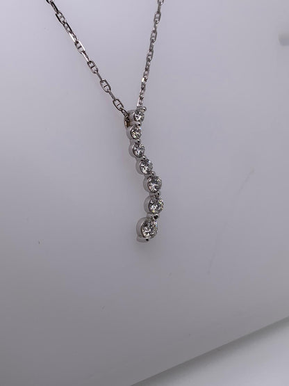 "PEND01231" 18K White Gold Seven Diamond Wave Pendant