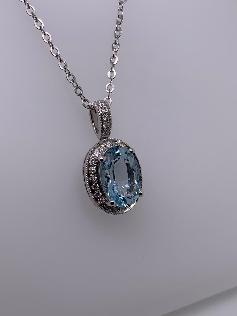 "PEND0174" 14K White Gold Aquamarine Pendant with Diamond Halo