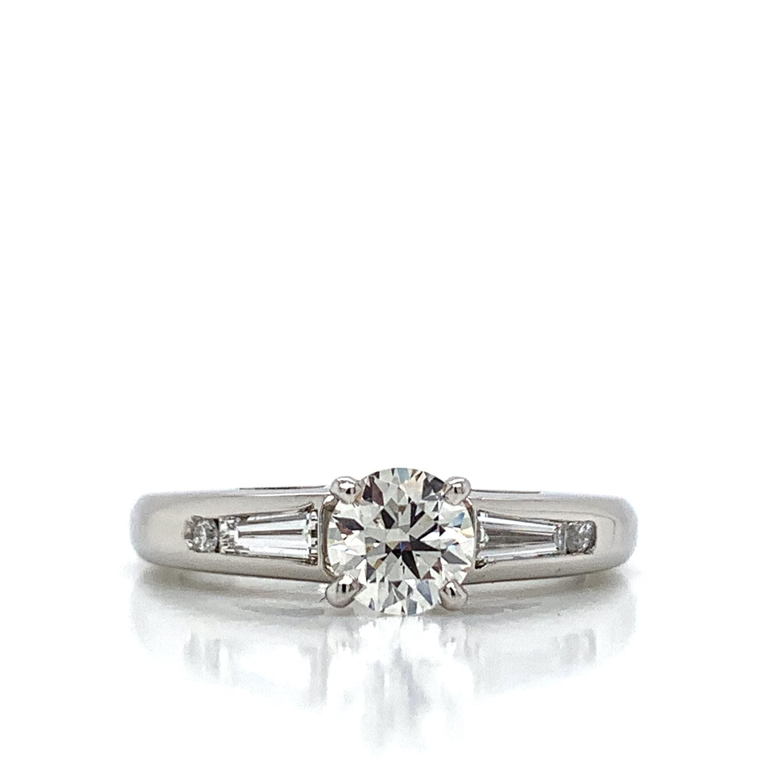 Round Diamond Engagement Ring with Baguette and Round Side Diamonds in Platinum