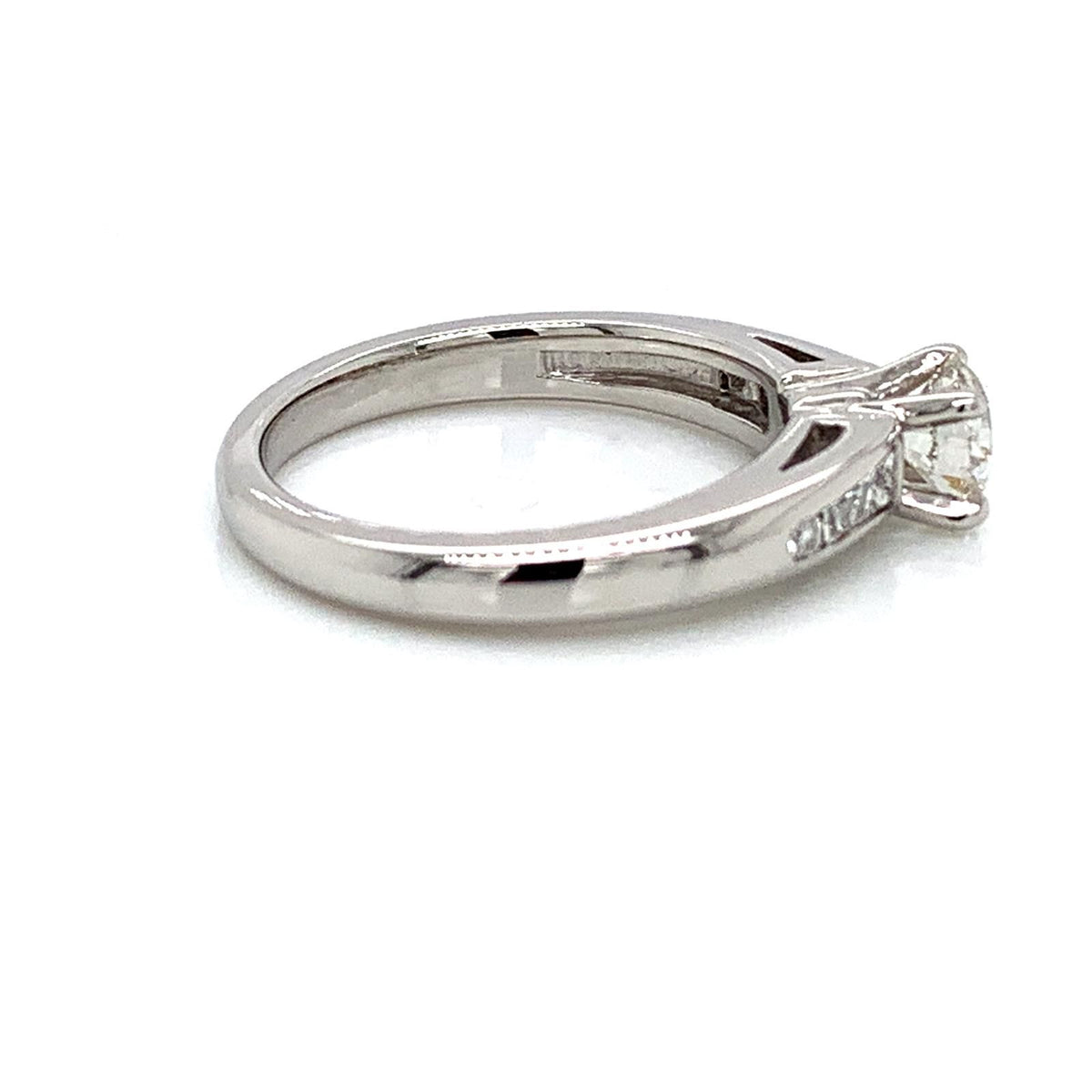 Round Diamond Engagement Ring with Baguette and Round Side Diamonds in Platinum