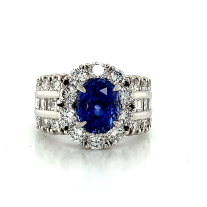 Sapphire and Diamond Halo Ladies Ring with Side Diamonds in Platinum