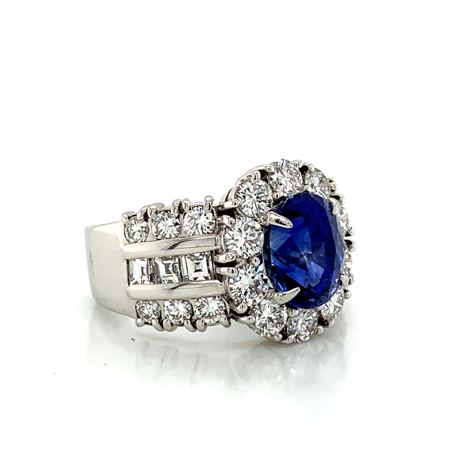 Sapphire and Diamond Halo Ladies Ring with Side Diamonds in Platinum