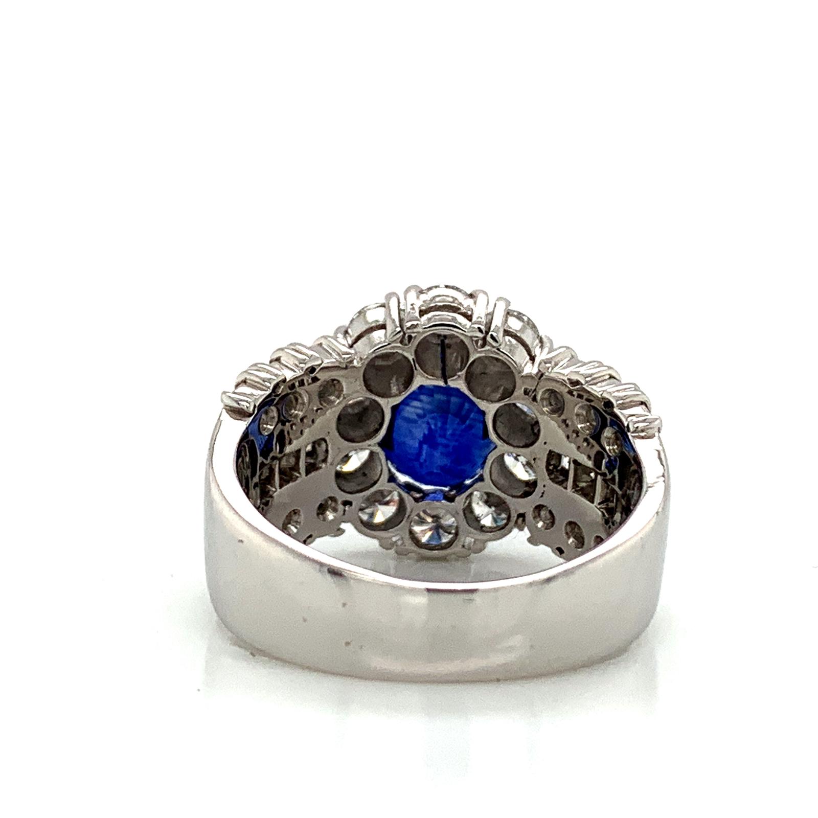 Sapphire and Diamond Halo Ladies Ring with Side Diamonds in Platinum