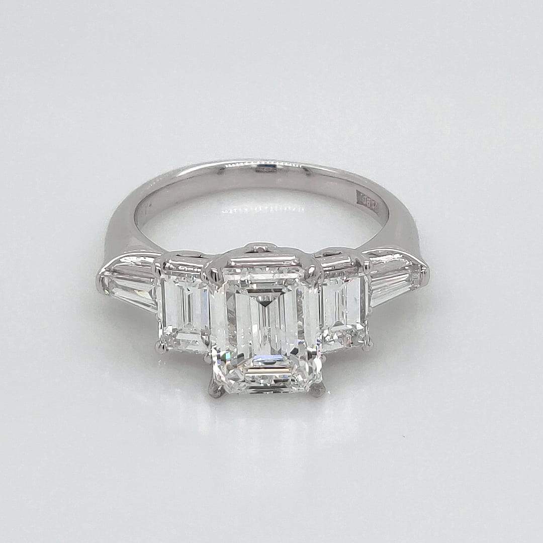 "ENGR03405" 3.45 Carat Emerald Shaped Diamond and Baguette Five Stone Engagement Ring in Platinum