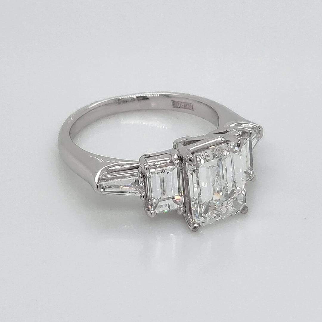 "ENGR03405" 3.45 Carat Emerald Shaped Diamond and Baguette Five Stone Engagement Ring in Platinum