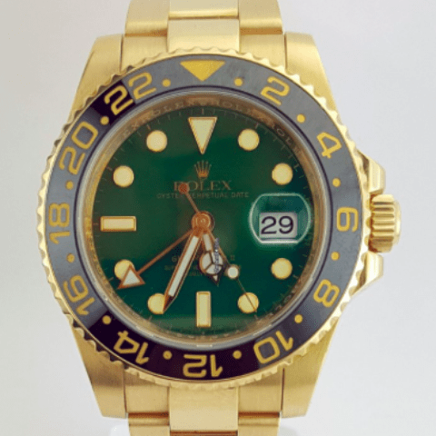 Rolex GMT Master II 18k Yellow and Steel RARE Green Dial MINT