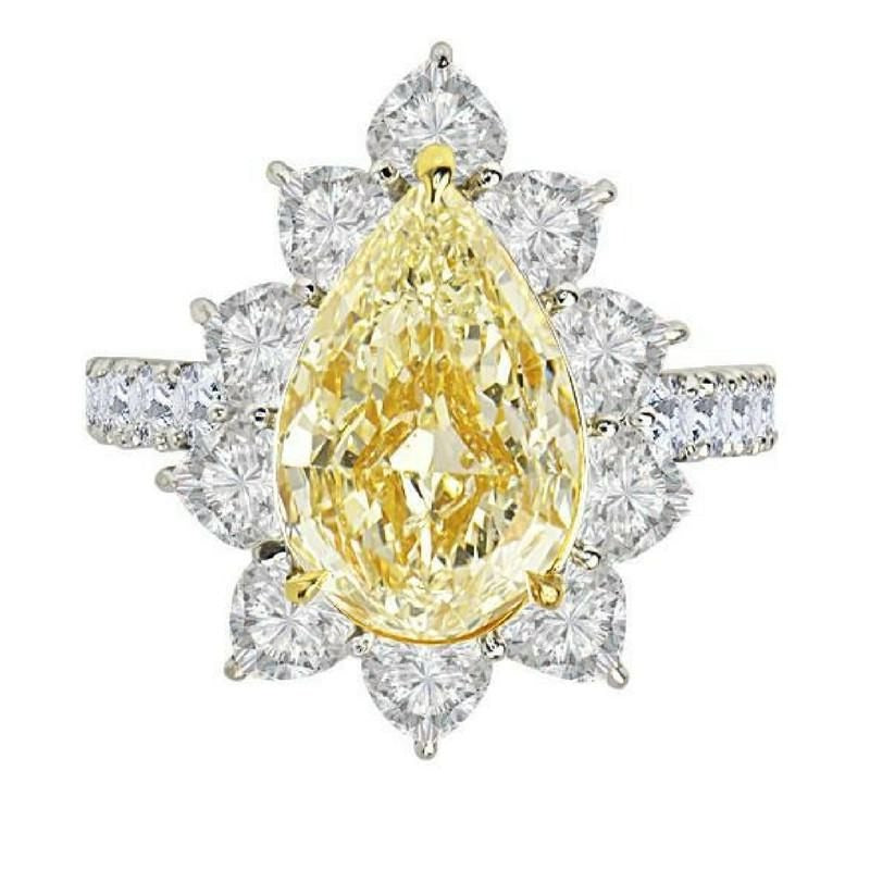 7.26 Total Carat Pear Shaped Halo GIA-certified Yellow Natural Diamond Ring