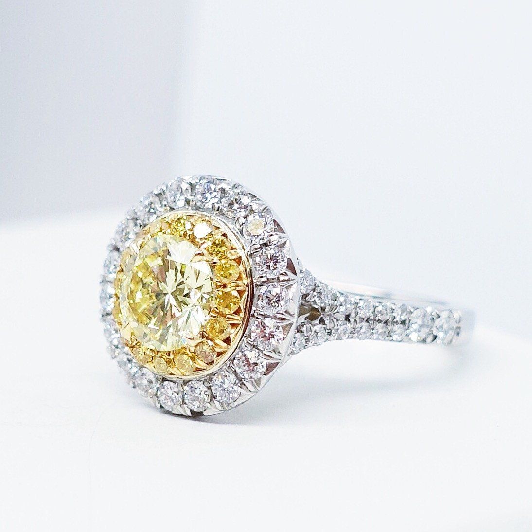 2.04 Total Carat Fancy Yellow Diamond Ladies Engagement Ring. GIA Certified.