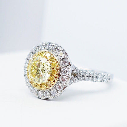 2.04 Total Carat Fancy Yellow Diamond Ladies Engagement Ring. GIA Certified.